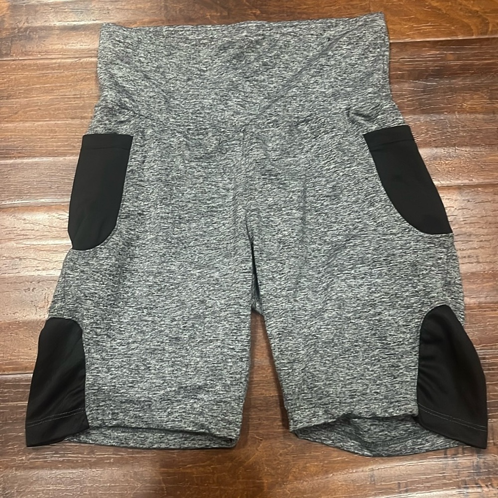 These are Joan Vasa biker shorts in size M in juniors section